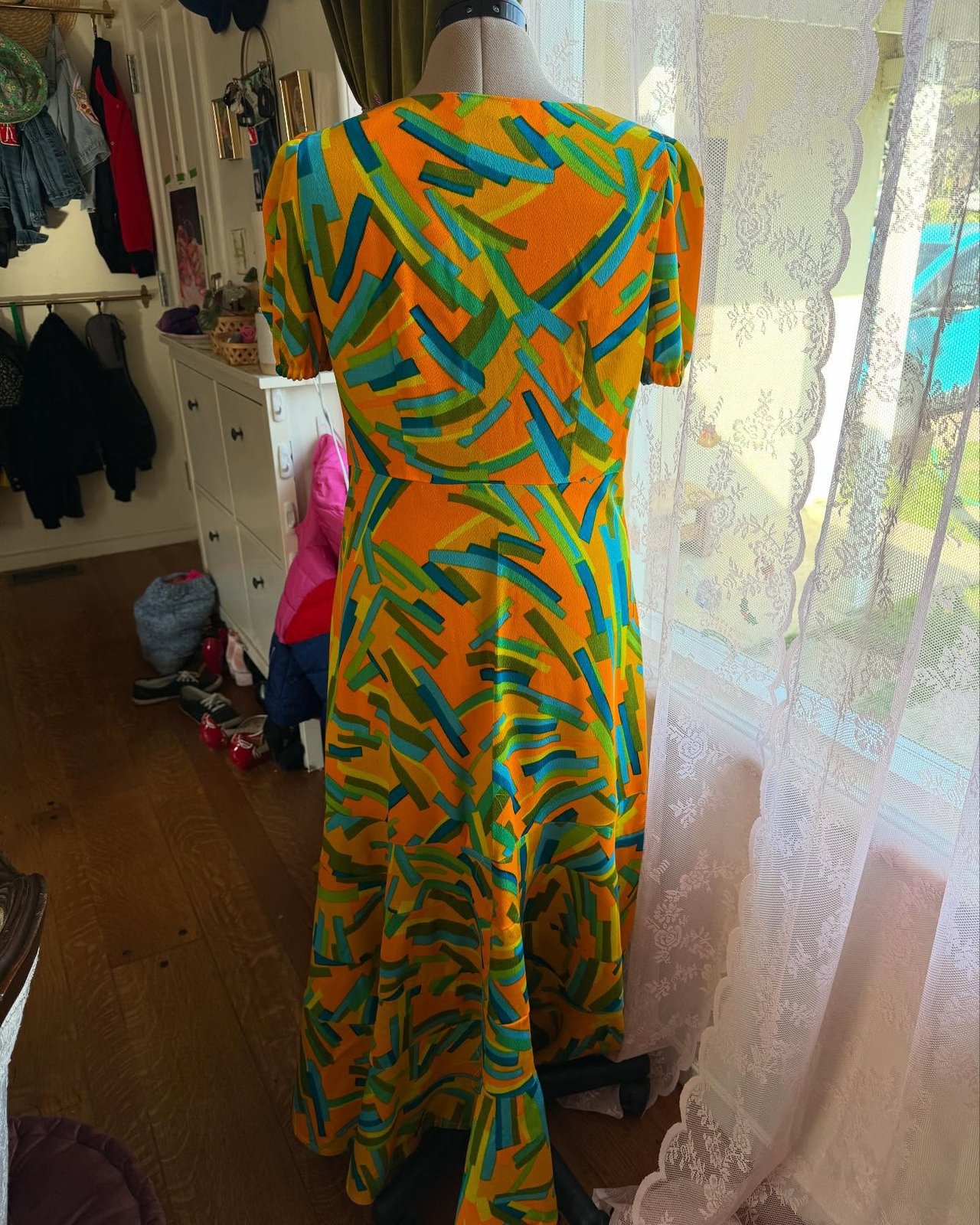 Finished dress with buttons-done caption