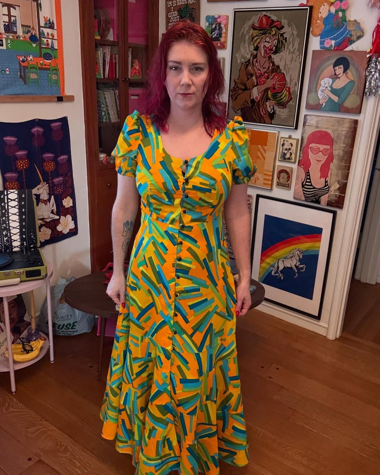 Front view of the finished dress by the window