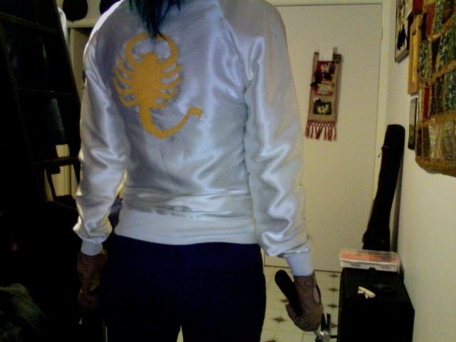 Worn, back view, full length